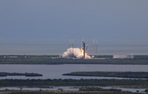 SpaceX Falcon 9 rocket launch representing the 2025 NASA IMAP mission to study solar forces and the heliosphere.